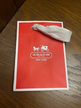 Coach Red/Orange Gift Bag with Silver Logo and White Ribbon Handles
